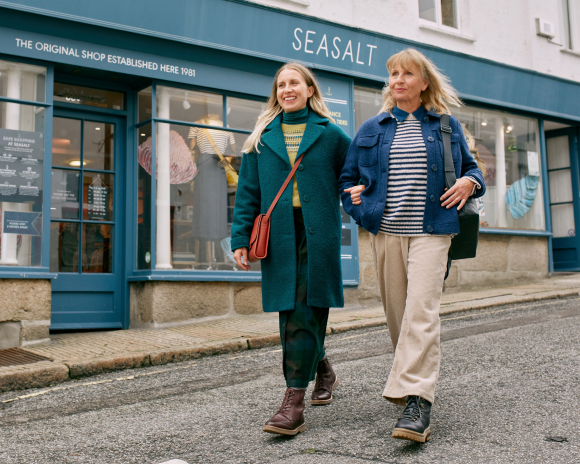 Two women walking through Penzance