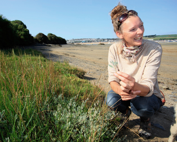Woman foraging for seaweed 