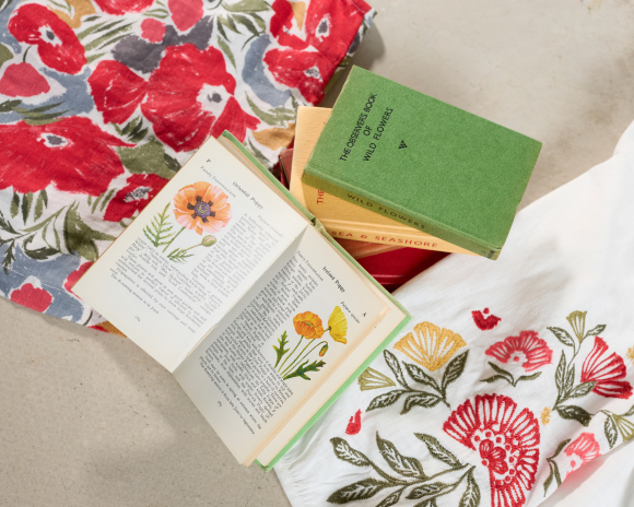laid out books and printed fabric swatches 